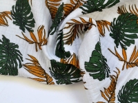 Ткань Муслин двухслойный (жатка) Тропические листья горчично-зеленые на белом 125г/м2 шир. 135см производства Китай состав 100% Хлопок